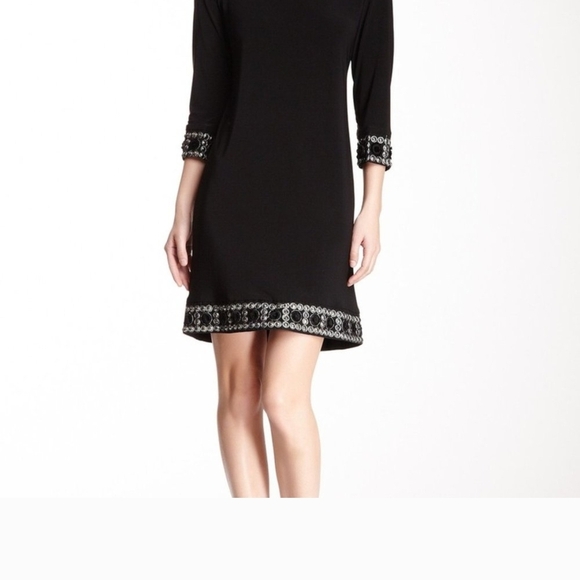 Tiana B. Elegant Black Dress with Embellished Cuffs - Picture 15 of 15